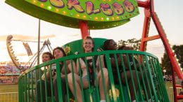 COURTESY OF JAROD JOHNSON Fins Festival attendees enjoy a carnival ride.