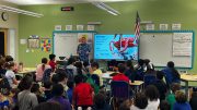 COURTESY OF STACEY GONZALEZ Brad Parks, conservation education director of Washed Ashore, speaks to fourth- grade students at NSU University School.