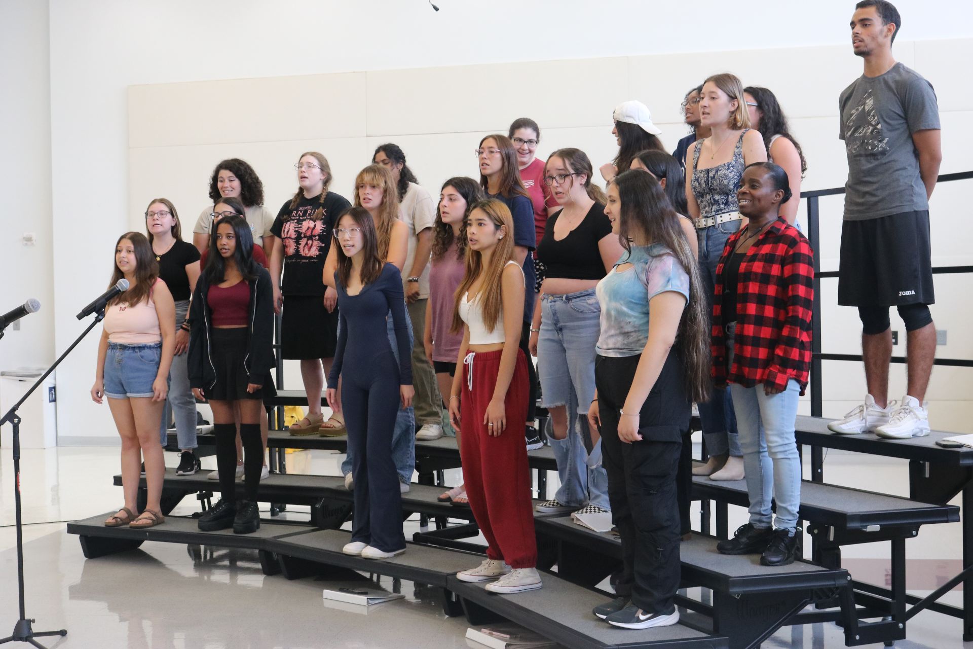PHOTO BY DANNA BERTELThe Bossa Nova Chorale practices the opening song "A Million Dreams" during rehearsal.
